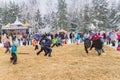 Moscow Region, Russia - February 18, 2018: Celebration of Russian Shrovetide. Children playing russian giants on the field