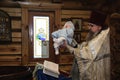 Moscow region, Russia, 01.22.2019. The Holy Orthodox rite of the sacrament of baptism newborn baby in a Christian Church