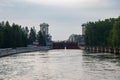 Moscow region, Russia, July 3, 2023. View of the old river lock from the stern of the ship.