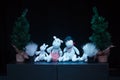 Moscow region / Russia - 01 06 2019: Moomin family of trolls in the dark. Moomintroll dolls in black background. A fabulous family