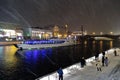 A cruise yacht sails on the Moscow river. Color winter photo. Royalty Free Stock Photo