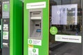 Moscow, Russia - October 19, 2019: Green parking payment terminal, device on a city street for digital pay