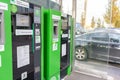 Moscow, Rusia - October 19, 2019: Green parking payment terminal, device on a city street for digital pay
