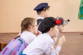 MOSCOW, RUSSI - MAY 06, 2018: Smiling children in carnival or concert costumes gossiping Royalty Free Stock Photo