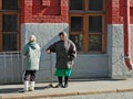Elderly Russian Ladies Chatting in Red Square, Moscow, Russia