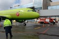 Airbus A319 airplane of S7-Siberia Airlines at a passenger telescopic gangway at Domodedovo International Airport Royalty Free Stock Photo