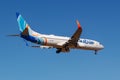 Moscow, Russia - April 03, 2019: Aircraft Boeing 737-8KNWL A6-FEV of Flydubai airline going to landing against blue sky at