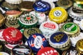 Background of beer bottle caps, a mix of various global brands Royalty Free Stock Photo