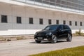 Moscow Russia - 19 April 2019 black mercedes benz ml w164 suv parked near modern building. Frontview.