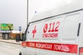 Moscow, Russia - April 19, 2020: coronavirus global pandemic, closeup of russian ambulance car on the city road. Side