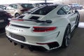 Moscow, Russia - April 29, 2019: Exclusive white matte Porsche 911 turbo in exclusive wide and carbon body kit named Stinger from