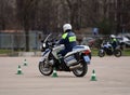 Inspectors of traffic police workout skills of extreme driving on official police motorcycles.