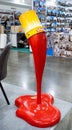 Moscow, Russia - April 21, 2023: Installation at the exhibition in the form of pouring red paint from a bucket onto the floor