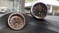 Moscow, Russia - April 23, 2019: Interior details of a sports car Porsche. Sports chronometer with electronic clock or analog