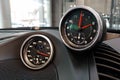 Moscow, Russia - April 23, 2019: Interior details of a sports car Porsche. Sports chronometer with electronic clock or analog