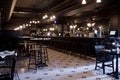 Moscow, Russia - April 04, 2012: Interior of Irish pub, dark colors, in day, no visitors, staff. Restaurant business concept,