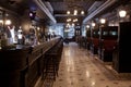 Moscow, Russia - April 04, 2012: Interior of Irish pub, dark colors, in day, no visitors, staff. Restaurant business concept,