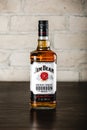 Jim Beam bourbon bottle on wooden table in bar