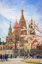 Moscow, Russia - April 12,2018: Moscow and St. Basil Cathedral at spring day through flowering tree Royalty Free Stock Photo