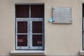 MOSCOW, RUSSIA - APRIL 30, 2018: A memorial tablet on the wall of the house and a paper airplane.