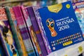 MOSCOW, RUSSIA - APRIL 27, 2018: Official album for stickers dedicated to the FIFA World Cup RUSSIA 2018 on store shelf. Royalty Free Stock Photo