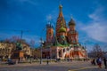 MOSCOW, RUSSIA- APRIL, 24, 2018: Outdoor view of unidentified people walking close to St. Basil`s Cathedral and Royalty Free Stock Photo