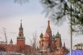 Panoramic view of Moscow Kremlin with Spassky Tower and Saint Basil's Cathedral in center city on Red Square from Royalty Free Stock Photo