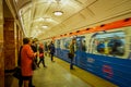 MOSCOW, RUSSIA- APRIL, 29, 2018: People waiting for underground train departs from the Metro Akademicheskaya, Russian Royalty Free Stock Photo