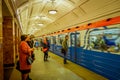 MOSCOW, RUSSIA- APRIL, 29, 2018: People waiting for underground train departs from the Metro Akademicheskaya, Russian Royalty Free Stock Photo