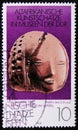 MOSCOW, RUSSIA - APRIL 2, 2017: A post stamp printed in DDR (germany) shows a ceramic doll face, the series 