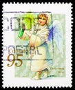 Postage stamp printed in Canada shows Angel with candle, Christmas serie, circa 1999 Royalty Free Stock Photo