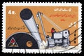 Postage stamp printed in Iran shows Laying of a pipeline, 20 years nationalized Iran`s oil industry serie, circa 1970