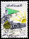 Postage stamp printed in Iraq shows General Kassem and parade of the army, Army Day serie, 10 Iraqi fils, circa 1961