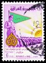 Postage stamp printed in Iraq shows General Kassem and parade of the army, Army Day serie, 6 Iraqi fils, circa 1961