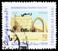 Postage stamp printed in Iraq shows Ktesiphon today Taq-i Kisra: Palace of Shapur I, International Year of Tourism serie, circa