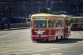 MOSCOW, RUSSIA - APRIL 21, 2018: Retro trams goes to the parade on the empty old city street of Moscow, Russia, April 21, 2018.