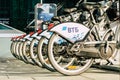 A row of available bike for rent with an logo of VTB Bank. Rentals bicycles vtb in the parking lot in the city