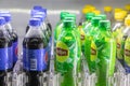 Moscow, RUSSIA - April 12, 2019: rows of Lipton and Pepsi bottles. Plastic bottle holders in vending machine