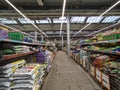 Shelves with gardening supplies in the OBI store in Moscow Russia