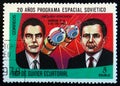 MOSCOW, RUSSIA - APRIL 2, 2017: A stamp printed in Guinea Equatorial shows Vostok 3 and 4 spaceship, 1962, and portraits