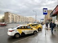 Moscow, Russia, April, 23, 2021.Taxi cars are parked on Mira Avenue near the metro station `Alekseevskaya`. Russia, Moscow
