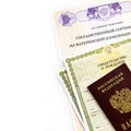 Moscow, Russia - April, 2019: Text Russian Federation State certificate on maternity family capital, passport, certificate of