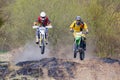 Moscow, Russia - April 13, 2019: Two racers on a motocross bikes rushes along a dirt track. Training of motocross sports team Royalty Free Stock Photo
