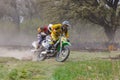 Moscow, Russia - April 13, 2019: Two racers on a motocross bikes rushes on a country road. Training of motocross sports team Royalty Free Stock Photo