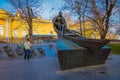 MOSCOW, RUSSIA- APRIL, 29, 2018: Unidentified man with his boy playing close to the Monument to writer Mikhail Sholokhov