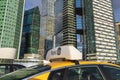 Moscow, Russia- April 25, 2021: A yellow Yandex taxi on the Moscow streets