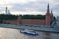 Moscow, Russia - August 2020: Beautiful panoramic postcard view of the wall of the Moscow Kremlin, Moscow River, boats