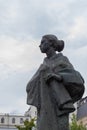 Moscow, Russia - August 24, 2020: Bronze monument to the revolutionary Nadezhda Krupskaya. Close-up profile portrait. Young woman