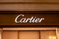 MOSCOW, RUSSIA - AUGUST 10, 2021: Cartier brand retail shop logo singboard on the storefront in the shopping mall.