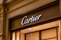 MOSCOW, RUSSIA - AUGUST 10, 2021: Cartier brand retail shop logo singboard on the storefront in the shopping mall.